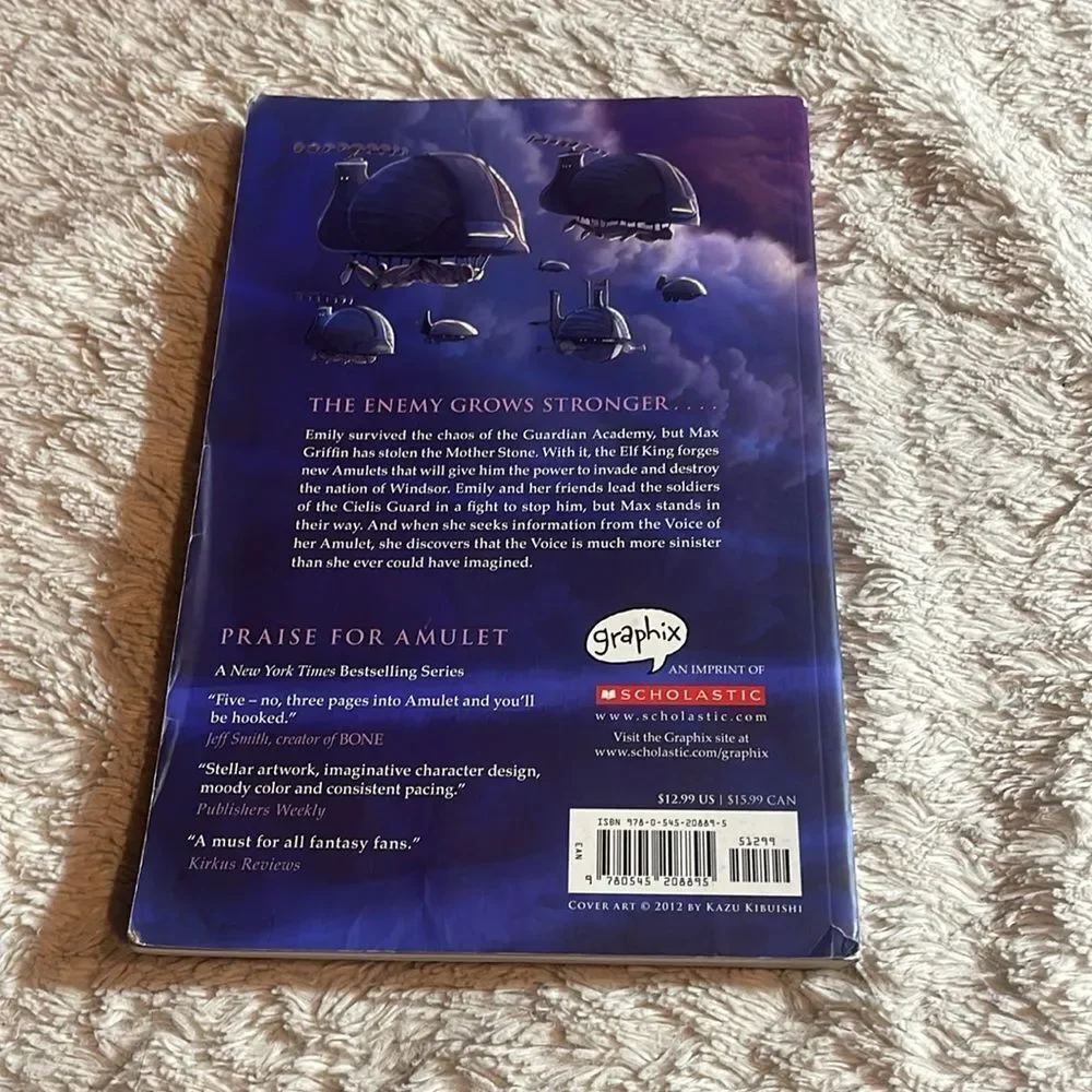 Scholastic Amulet Graphic Novel with Blue Cover